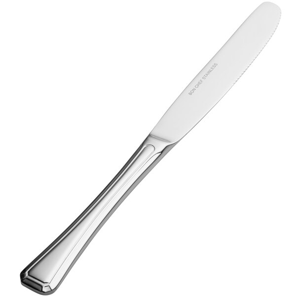 A silver knife with a hollow handle.