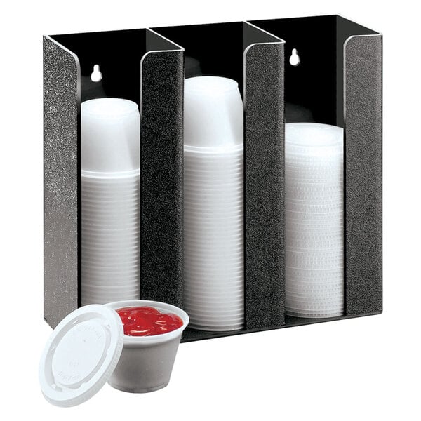 A black metal Cal-Mil countertop lid organizer with three white plastic lids.