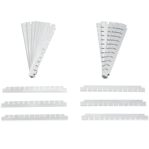 A set of white plastic strips with different sizes for a Nemco Easy Chopper Vegetable Dicer blade.