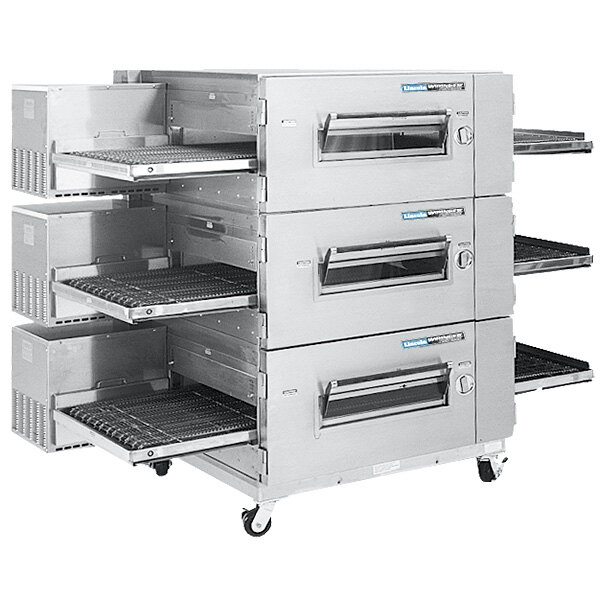 A large metal Lincoln Impinger conveyor oven with three conveyor racks.
