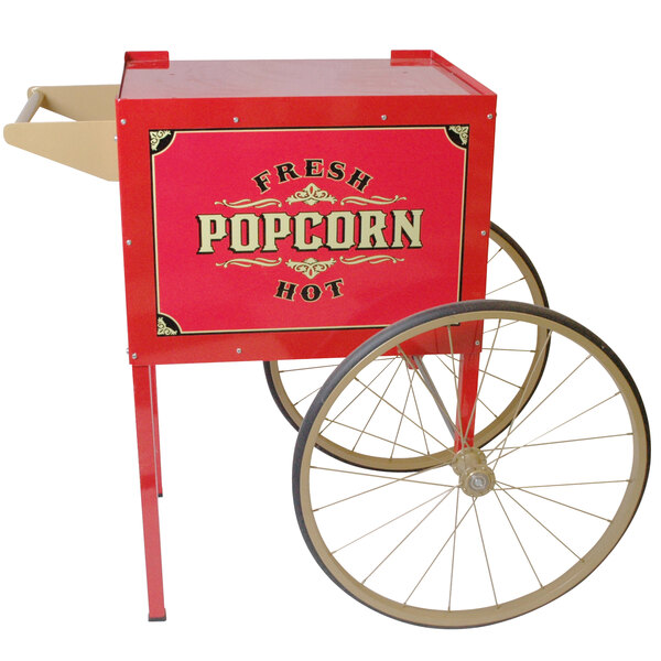 A red and white Benchmark USA Street Vendor popcorn cart with wheels.