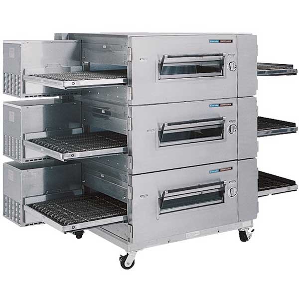 A Lincoln Impinger conveyor oven with a belt inside.