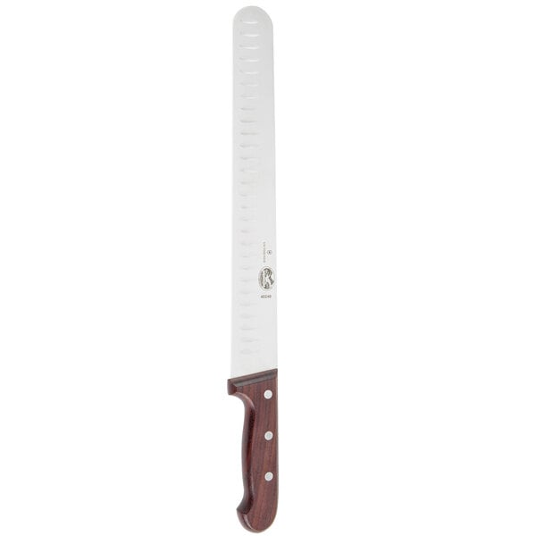 A Victorinox meat slicing knife with a rosewood handle.