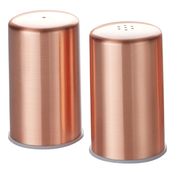 An American Metalcraft copper salt and pepper shaker set on a table.