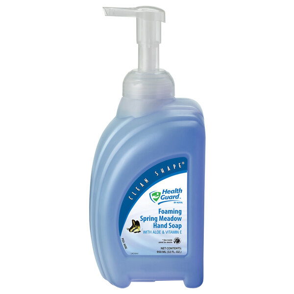 A Kutol Health Guard Clean Shape bottle of Spring Meadow hand soap with a blue label.