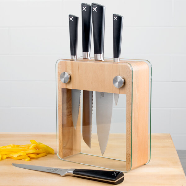 A Mercer Culinary Z&#252;M&#174; knife block with knives in it.