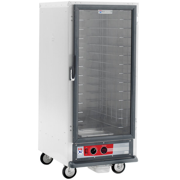 A Metro C5 heated holding cabinet with clear glass doors.