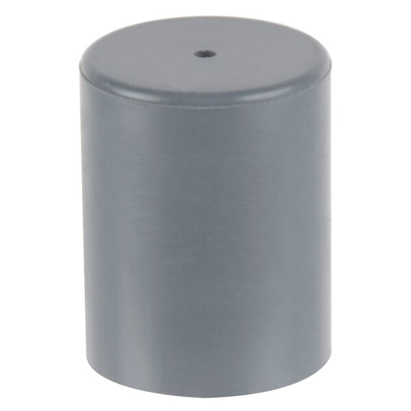 A grey cylindrical object with a cap on one end.