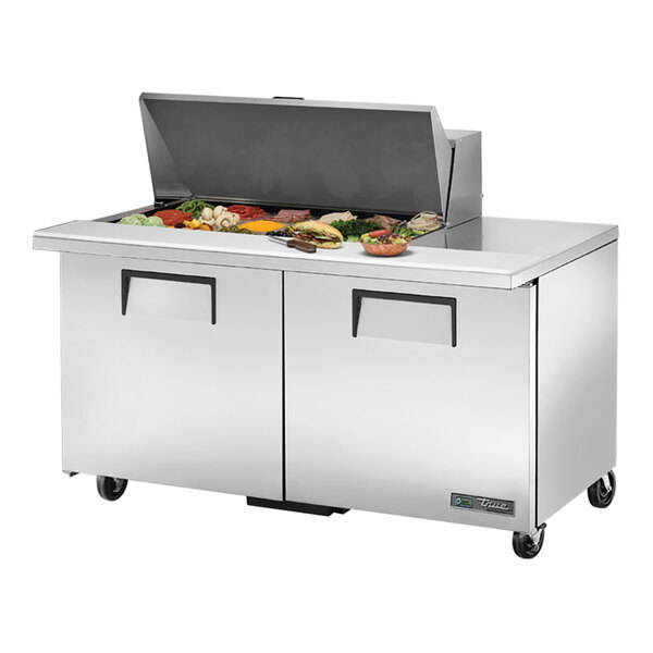 A True stainless steel Mega Top sandwich prep table with two doors.
