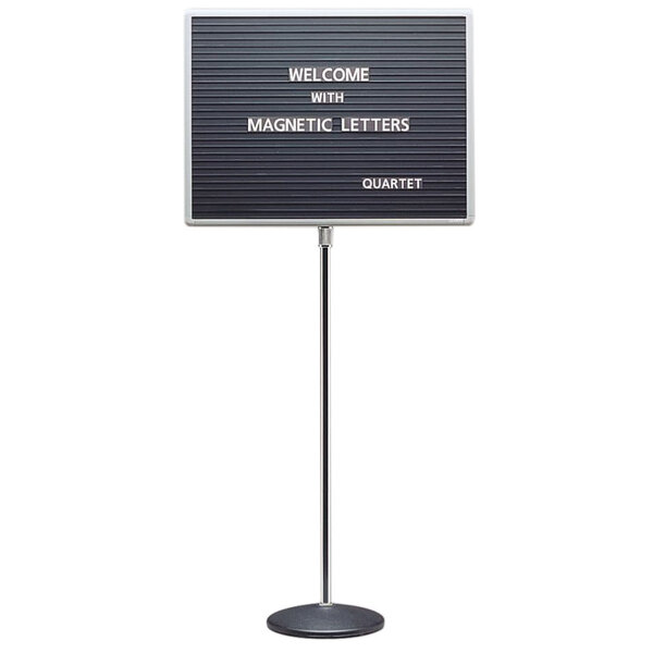 A black Quartet single pedestal stand with a white magnetic sign on it.