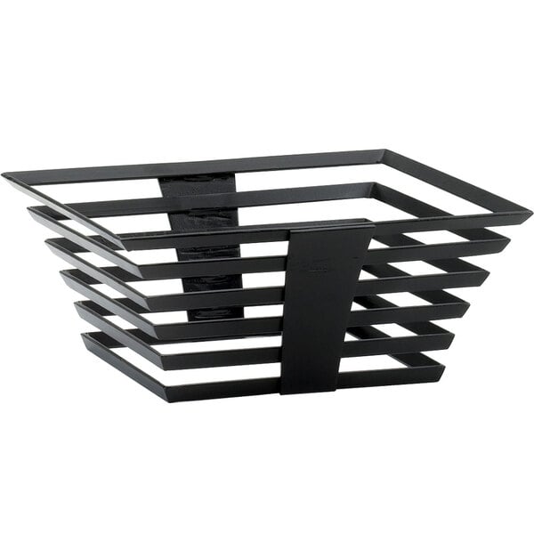 A black metal elevation riser with black strips on a table.