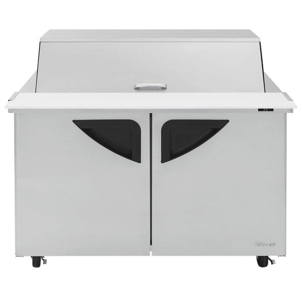 A stainless steel Turbo Air sandwich prep table with two doors and a mega top.