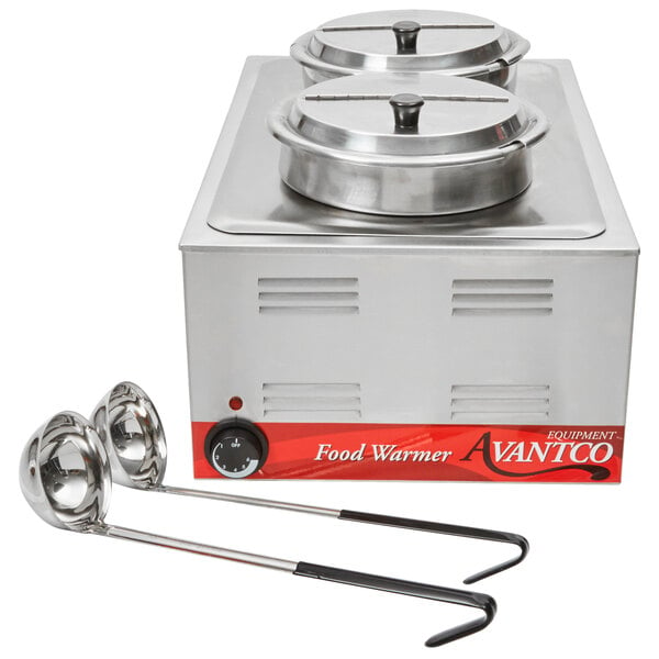 A silver Avantco countertop food warmer with two lids and a pair of ladles.