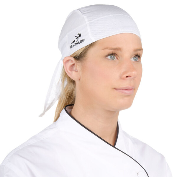 A woman wearing a white Headsweats chef bandana.
