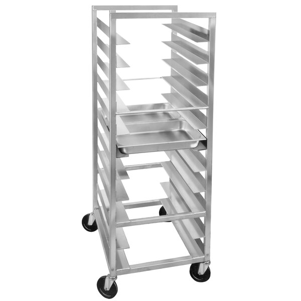 A Channel heavy-duty silver metal steam table pan rack with wheels holding 7 trays.