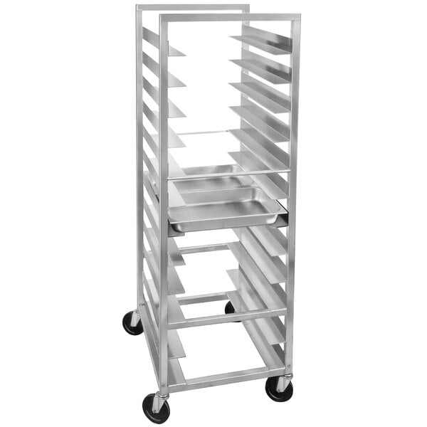 A Channel heavy-duty aluminum steam table pan rack with trays on it.