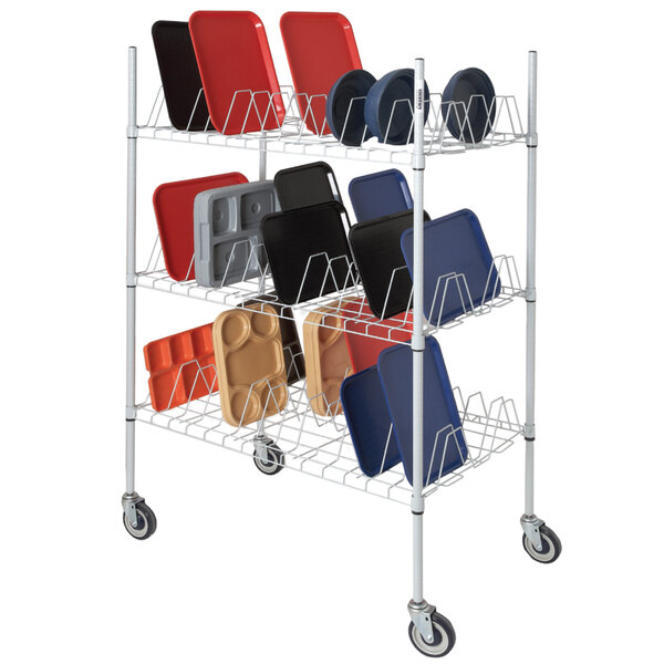 A Channel metal drying rack with blue trays on it.