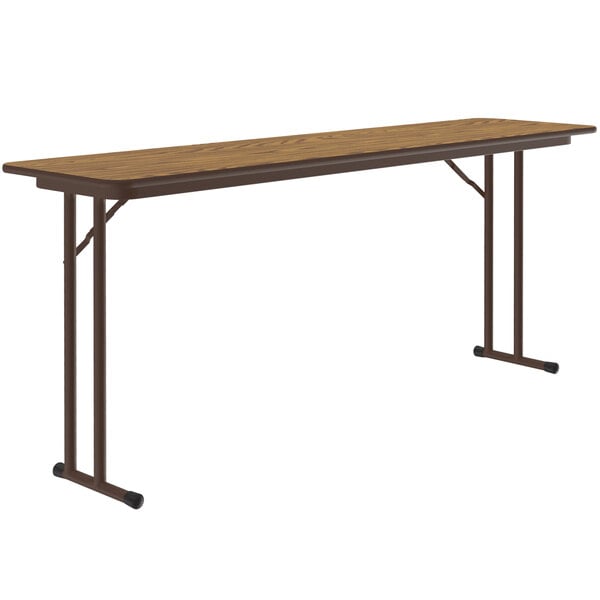 A brown rectangular Correll seminar table with black metal legs.
