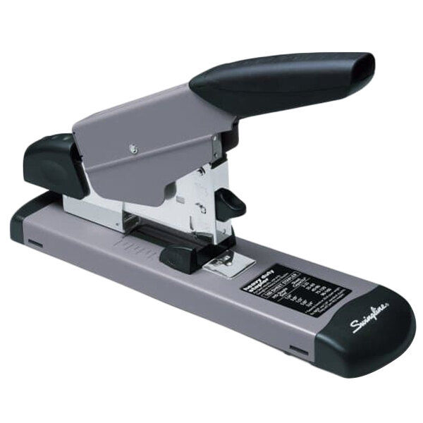 A Swingline heavy-duty stapler with a black and grey handle.