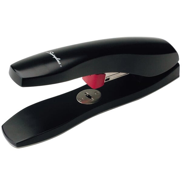 A black Swingline stapler with a red handle.