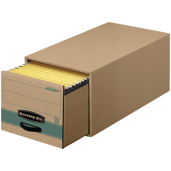 A brown Bankers Box storage drawer with yellow folders inside.