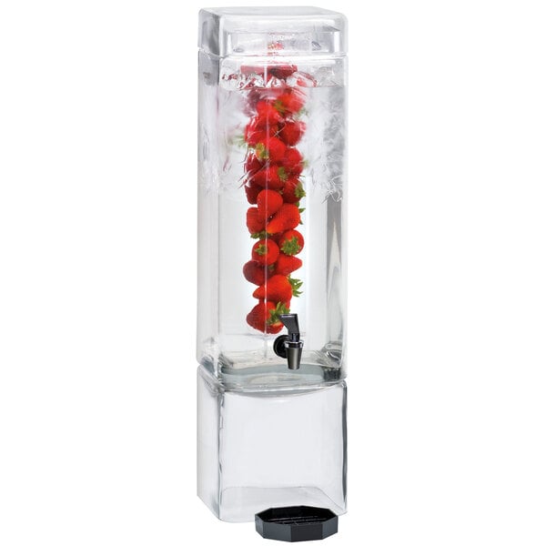A Cal-Mil square glass beverage dispenser with water and strawberries inside.