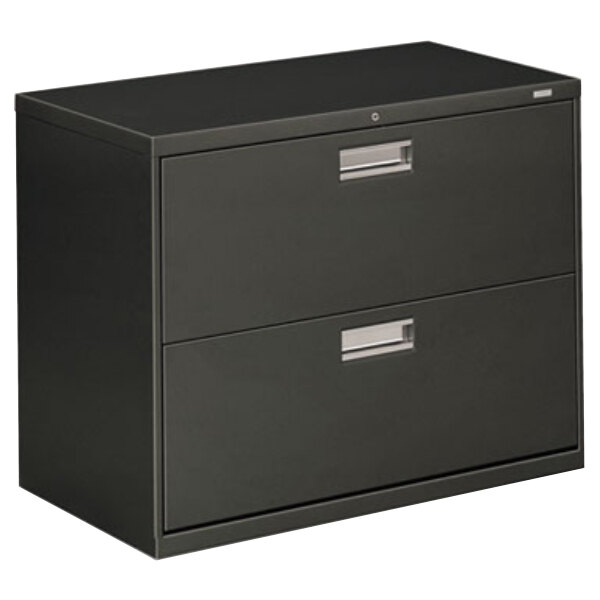 A black HON two-drawer lateral filing cabinet.