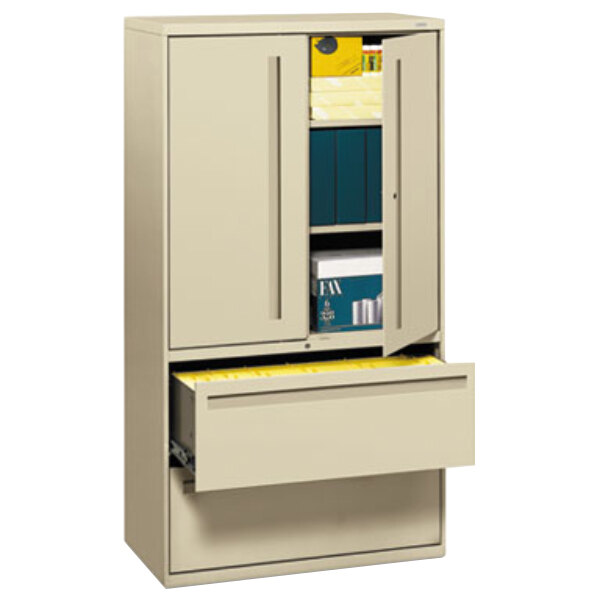 A HON putty lateral file cabinet with two drawers.