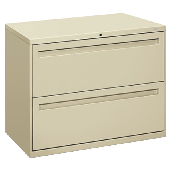 A tan HON 700 Series two-drawer lateral filing cabinet.