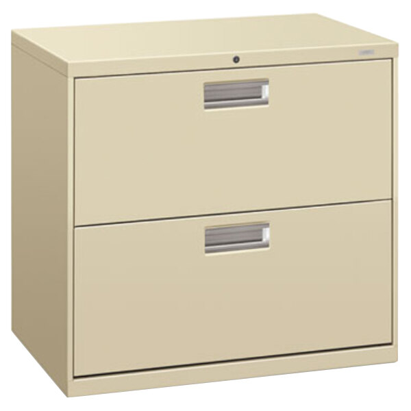 A tan HON 600 Series two drawer lateral filing cabinet.