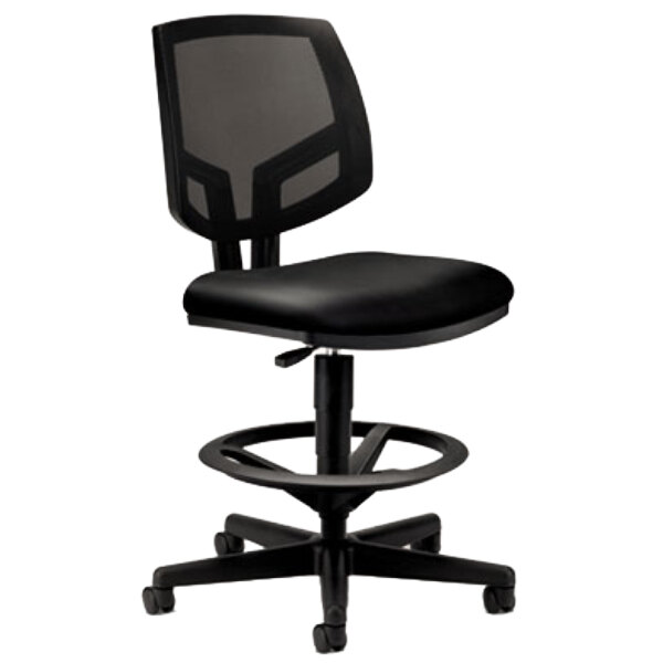 A black HON Volt office task stool with a black mesh seat and back and a footring.