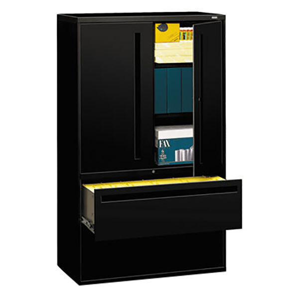 A black HON storage cabinet with two lateral filing drawers.