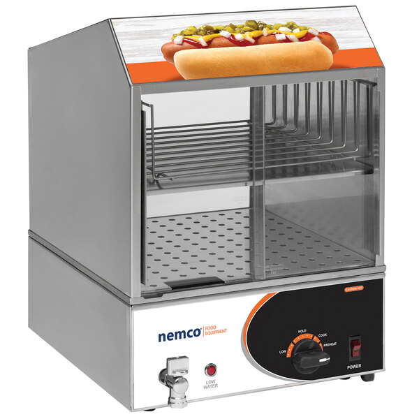 A Nemco countertop hot dog steamer with a hot dog inside.