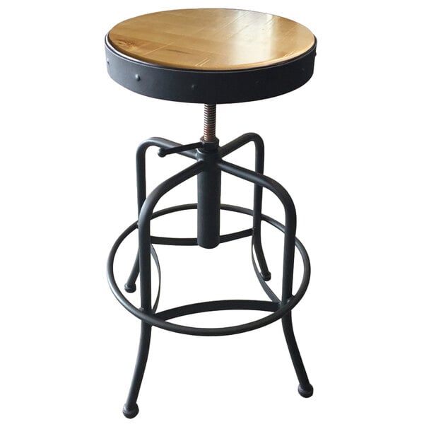 A black Holland Bar Stool with a natural wood seat and metal base.