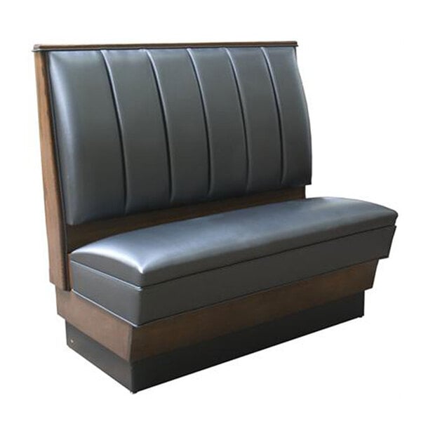 An American Tables & Seating Single Deuce booth with black leather and wood channel back.