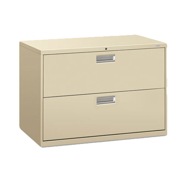 A putty HON 2-drawer lateral filing cabinet.