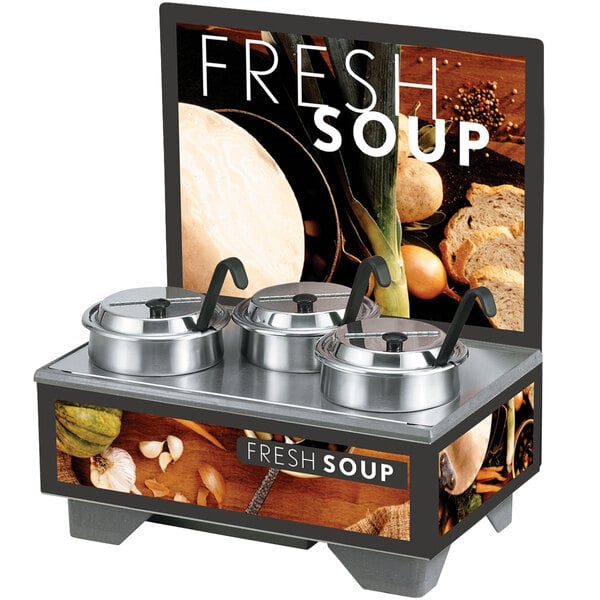 A Vollrath countertop soup merchandiser with a menu board and 4 bowls on a counter.