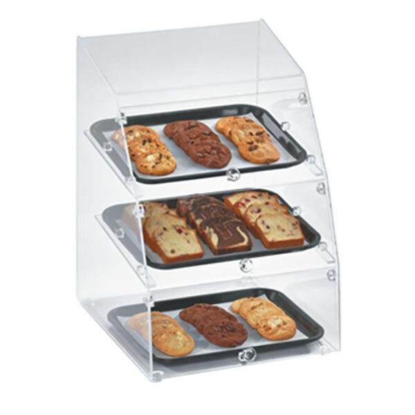 A Vollrath bakery display case with three trays of cookies.