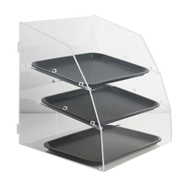 A Vollrath clear acrylic bakery display case with three trays on a shelf.