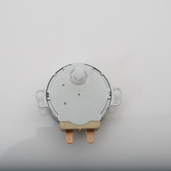 A small round metal Amana 56002013 motor.