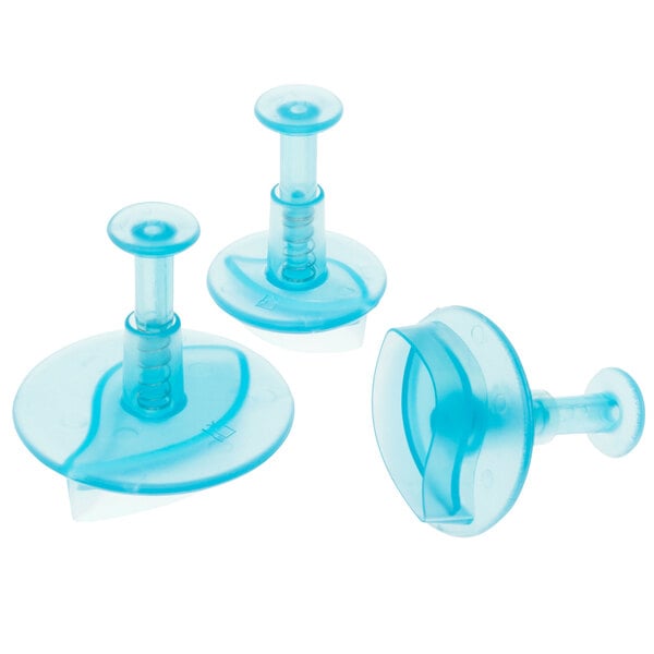 A group of blue plastic Ateco leaf plunger cutters.
