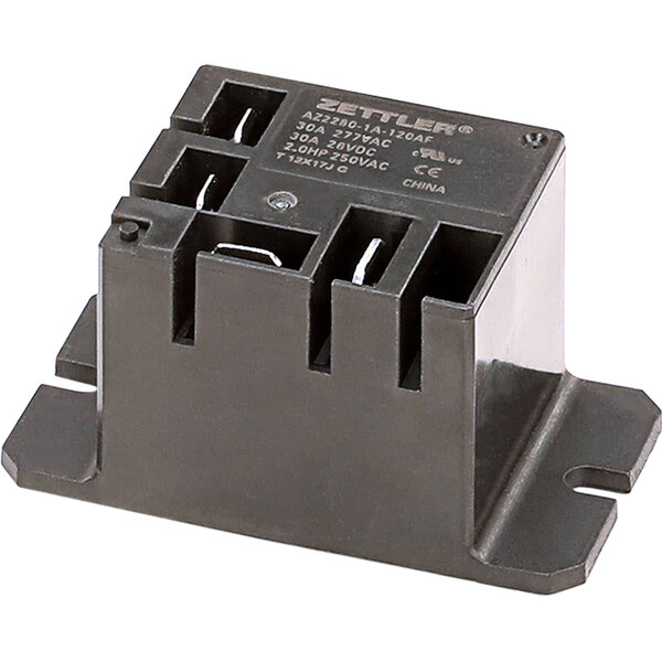 A black Vollrath relay switch with white text on it.