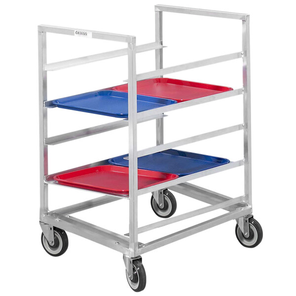 A Channel metal tray cart with three trays on it.