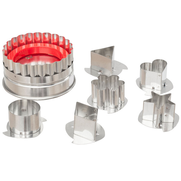 A set of Ateco stainless steel Linzer tartlet cutters, including a red one.