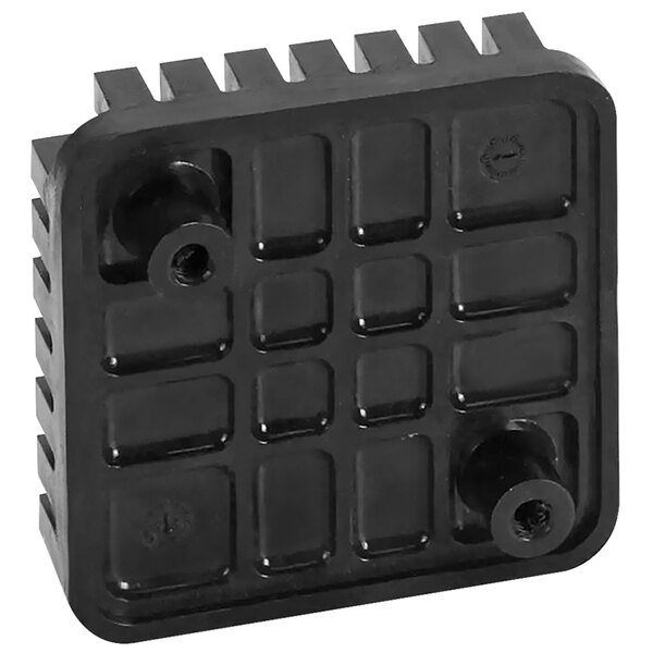 A black plastic square push pad with four holes.