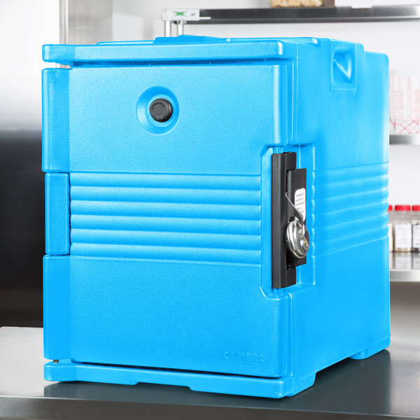A blue plastic box with a lock.
