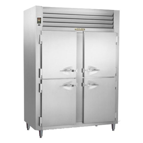 A Traulsen two section half door narrow reach-in refrigerator with a stainless steel exterior and two doors.