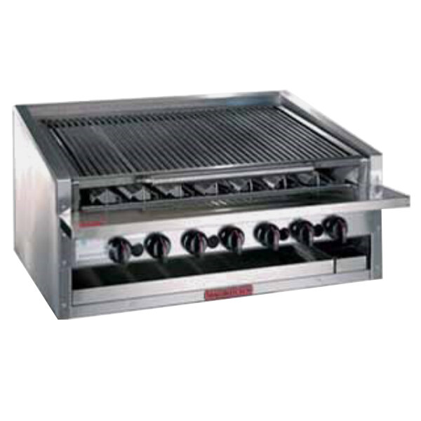 A MagiKitch'n stainless steel low profile lava rock charbroiler on a counter.