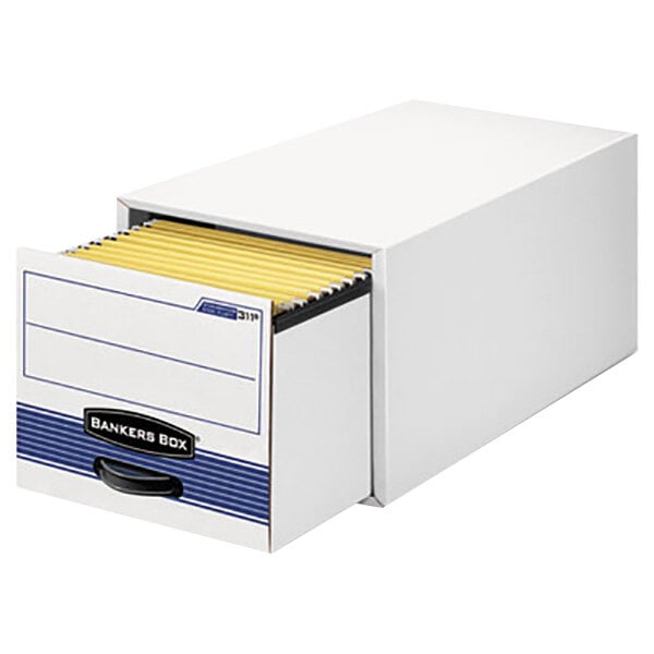 A white Bankers Box file drawer with yellow folders inside.