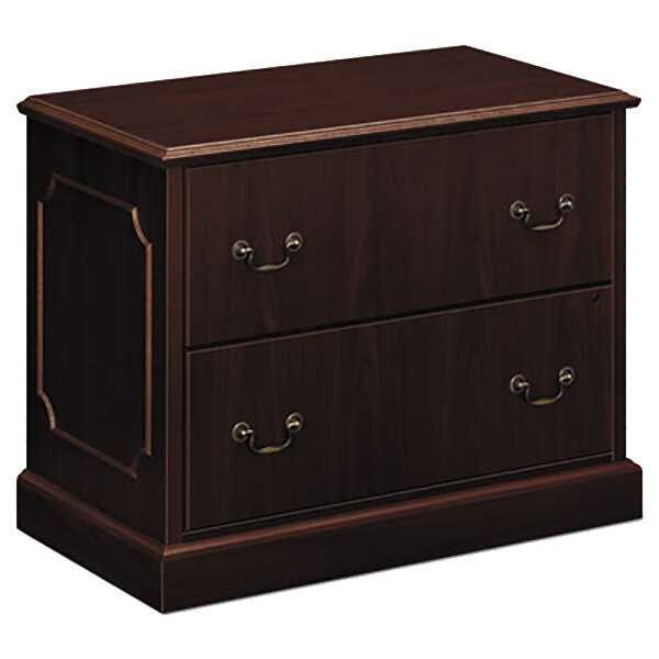A dark brown wooden lateral file cabinet with two drawers.